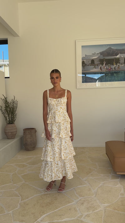 Isadora – Robe maxi fleurie en douceur pêche